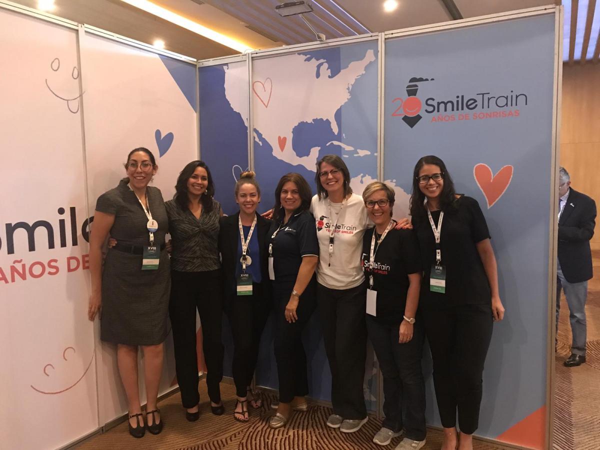 Silvia smiling with smile train staff