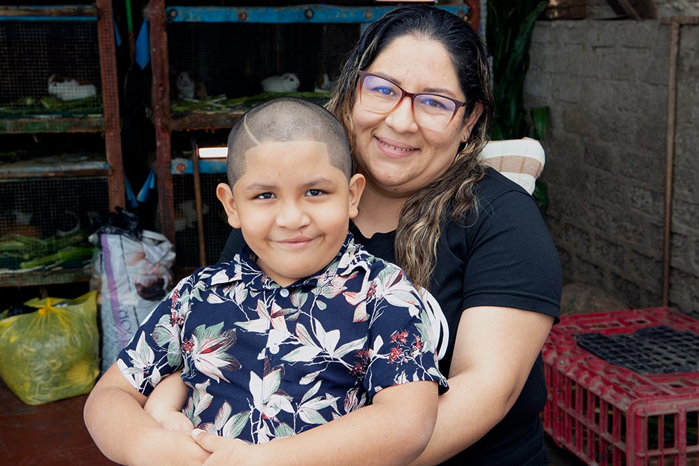 ramses and his mother rosa smiling and hugging