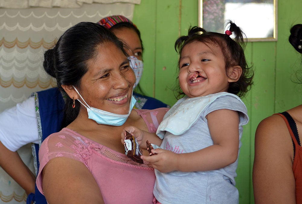 Jenifer smiles with her mother