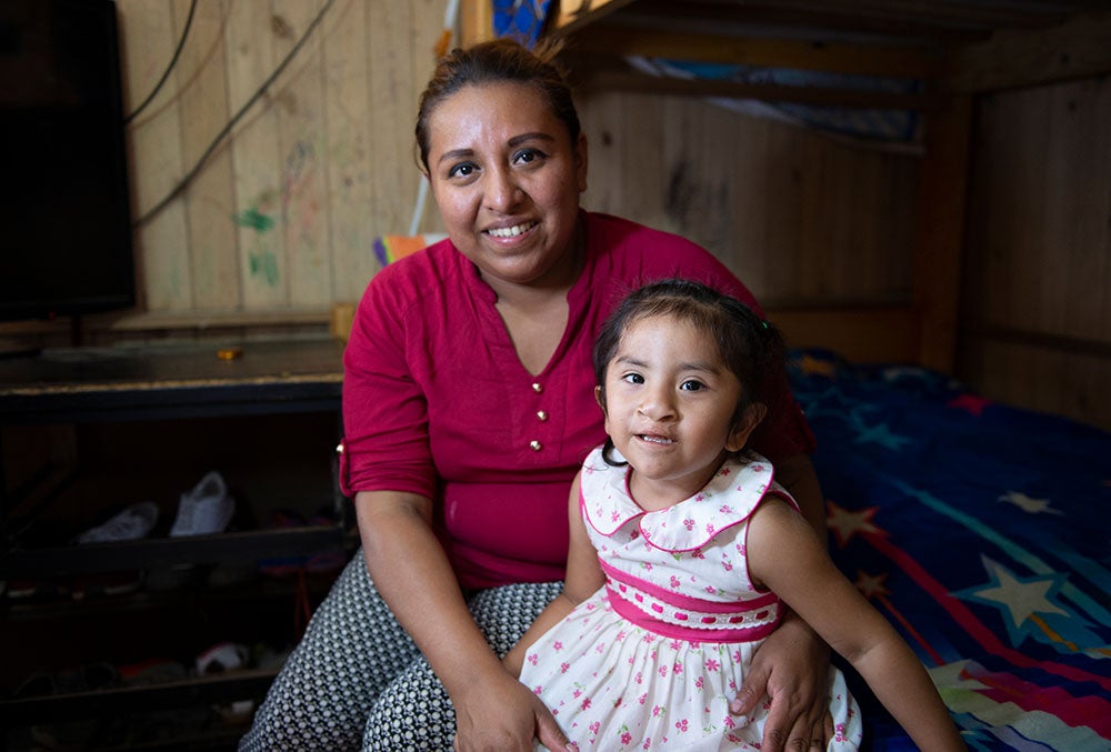 Kristhell and her mother Cinthya smiling