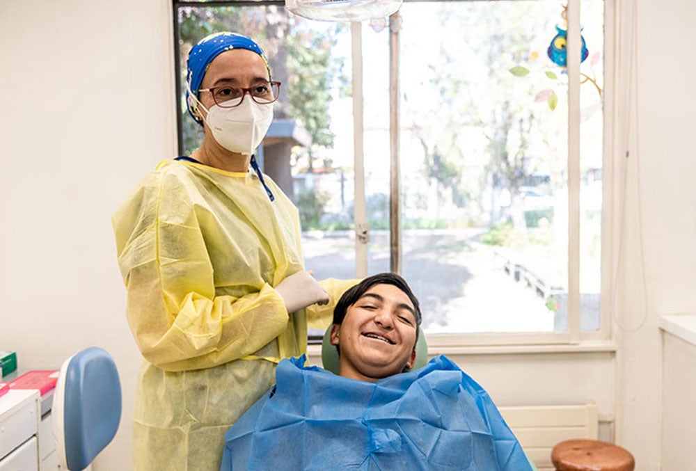 Vicente smiling at the dentist