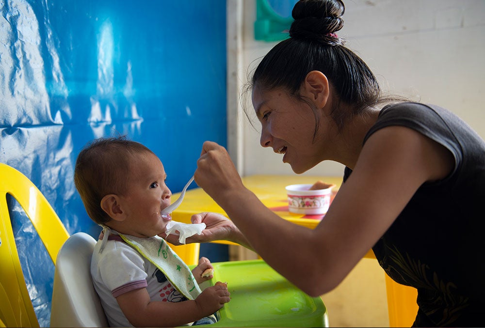 zindia spoonfeeding joseyur after his cleft surgery