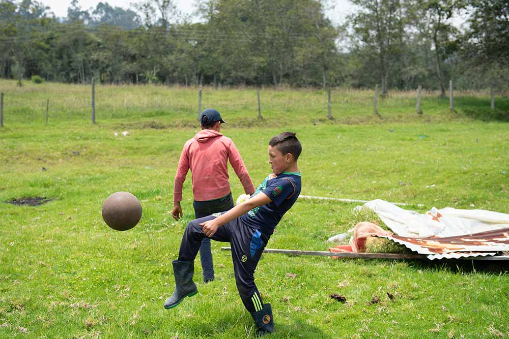 Neitan playing soccer