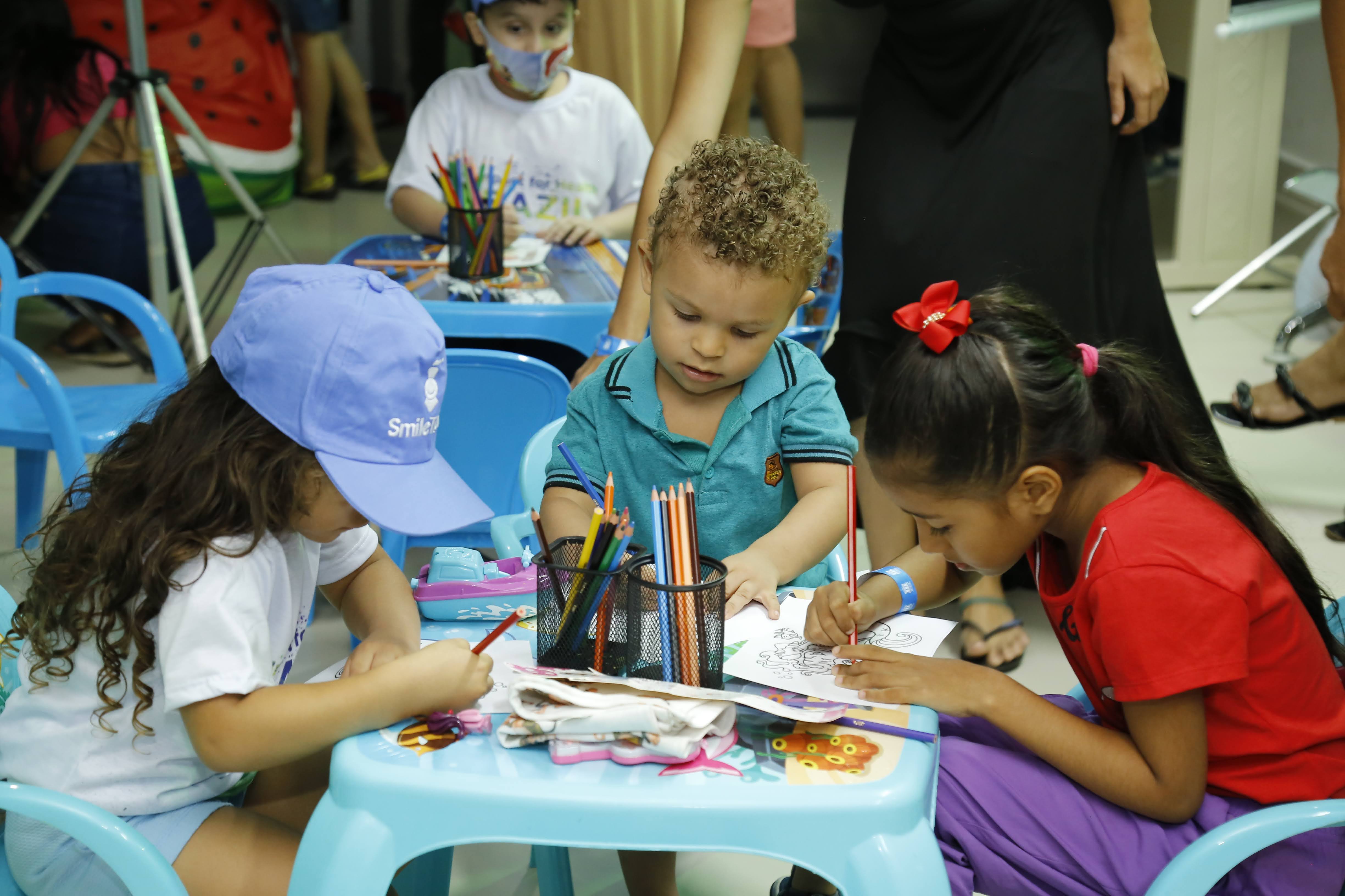 Children participating in art workshop