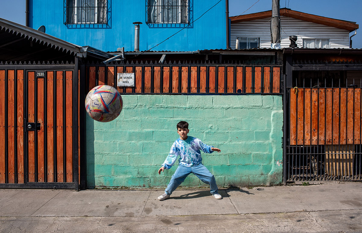 Joaquin defending the goal in a neighborhood football game