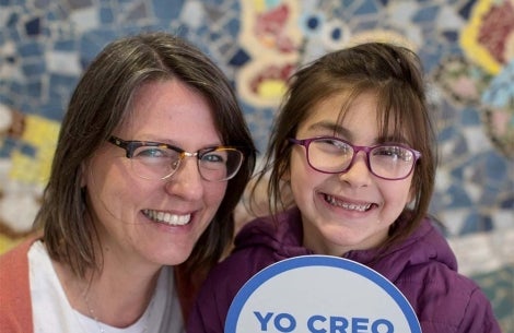 Silvia smiling with a patient