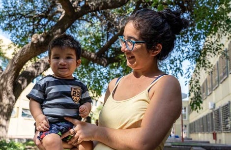 Felix smiling with his mother Noelia after cleft surgery