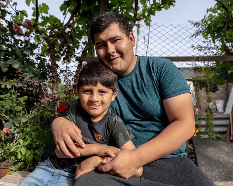 Ezequiel smiling with his father after cleft surgery